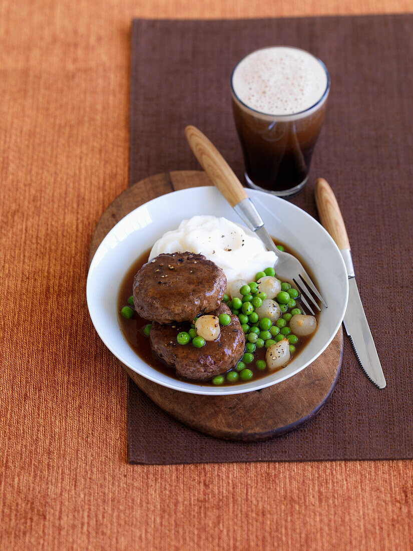 Beef Patty, Peas, Mashed Potatoes and Glass of Beer