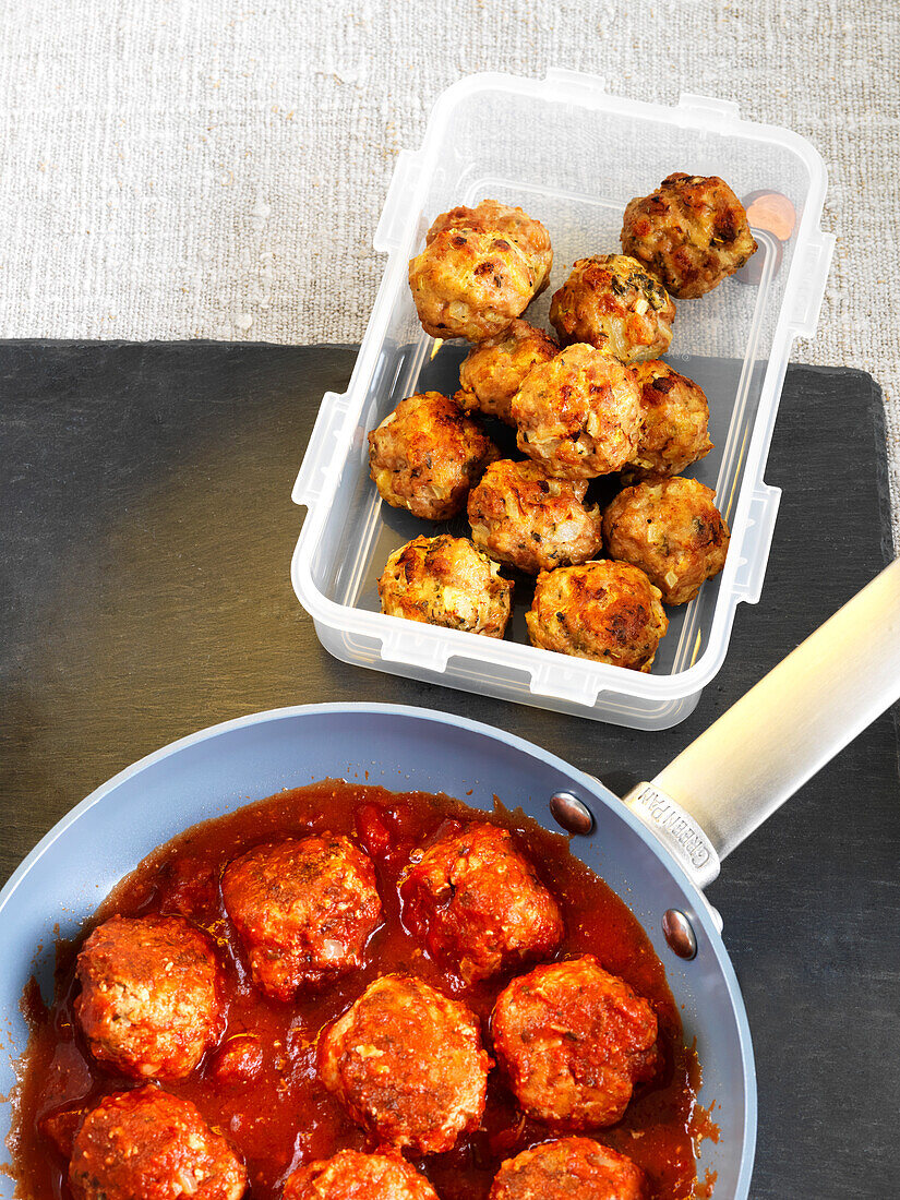 Container of Meatballs and Meatballs with Sauce in Pan