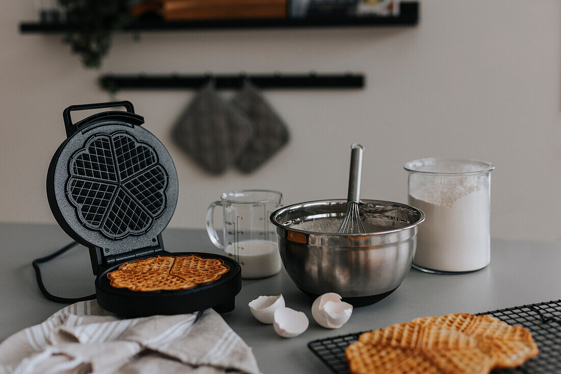View of waffles and waffle maker
