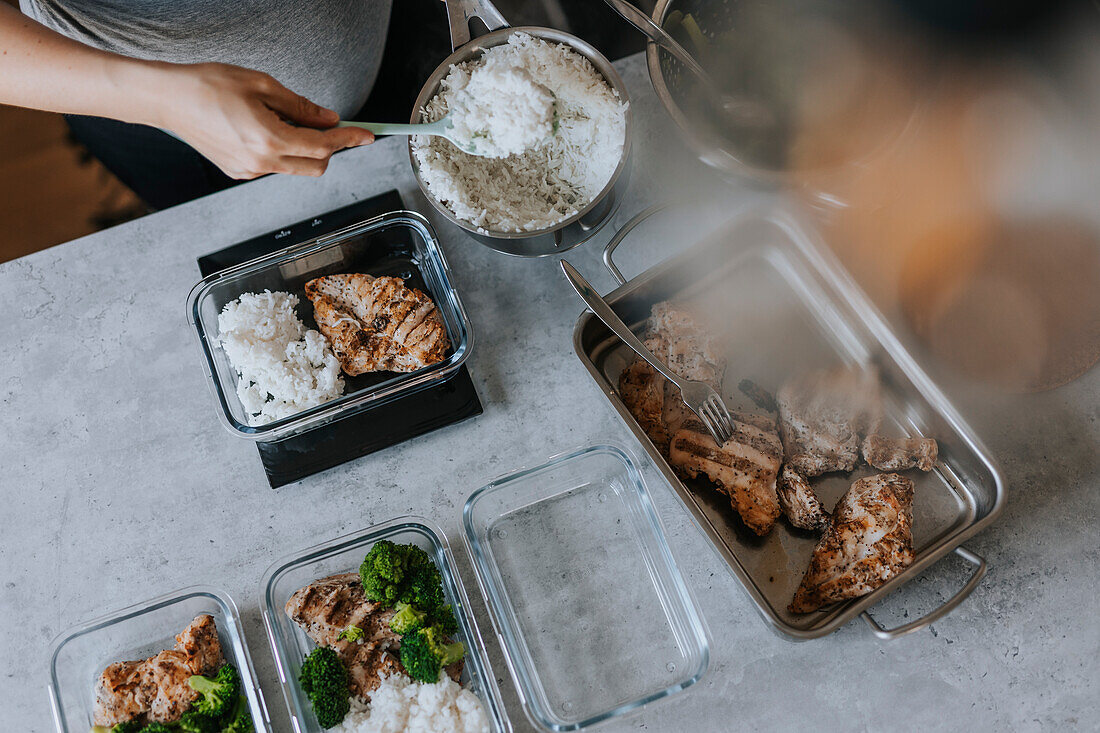 Woman doing healthy meal prep at home