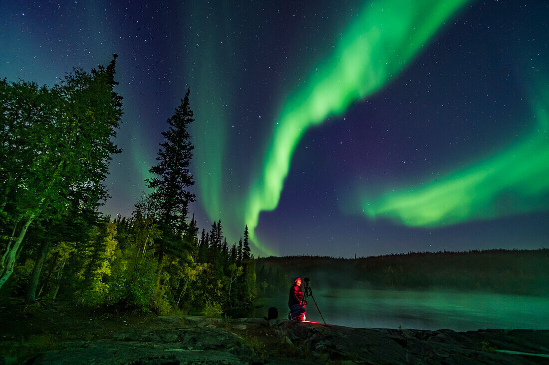 Photographer Stephen Bedingfield is shooting the Northern Lights at the Ramparts waterfalls on the Cameron River, September 8, 2019. The Big Dipper is at centre. The aspen trees are nicely turning colour.