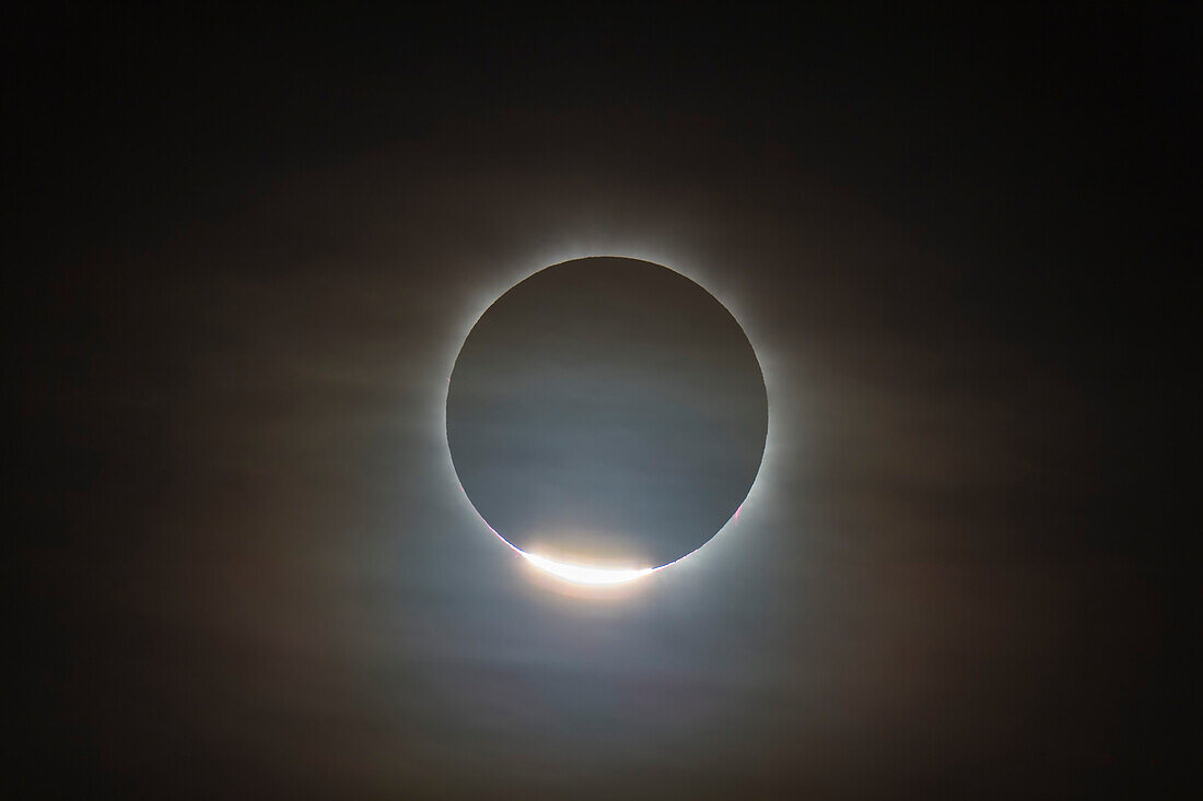 The first diamond ring during the total eclipse of the Sun, November 14, 2012, from a site near Lakeland Downs, Queensland, Australia. Shot through the Astro-Physics 105mm Traveler f/5.8 refractor scope, tracked on the AP 400 mount, and with the Canon 60Da. 1/1000th sec at ISO 100.
