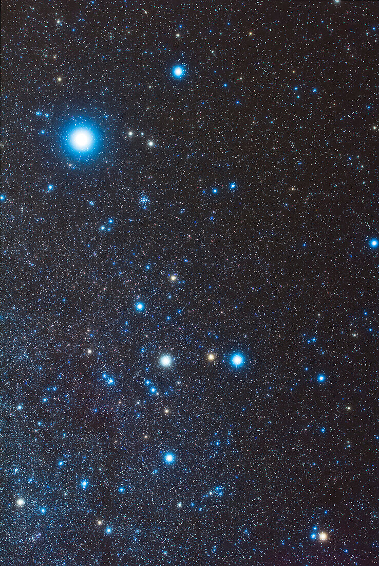 The constellation of Canis Major, including the bright star Sirius, and below it, the open cluster M41. At bottom is the loose cluster/asterism CR 140. This is a stack of 6 x 4 minute exposures at f/2.8 with the Sigma 50mm lens and Canon 60Da at ISO 800. I shot this from Coonabarabran, Australia with the constellation straight overhead. I used the iOptron Sky Tracker. High cloud added the natural glows around stars - no filter was employed here.