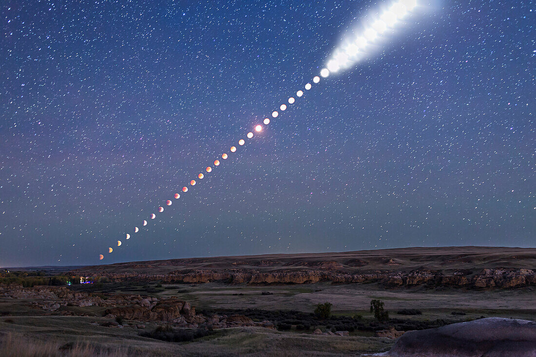 This is a multiple-exposure composite of the total lunar eclipse of Sunday, September 27, 2015, as shot from Writing-on-Stone Provincial Park, Alberta, Canada.