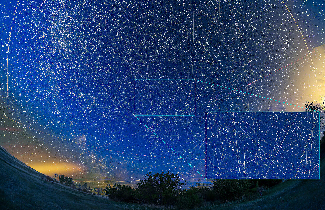 This is a blend of exposures showing all the satellites (and a few aircraft) recorded by the camera on a late spring night (June 1-2, 2022) from latitude 51° North, from where and when satellites are illuminated all night long and can be seen all through the short night. This is looking almost due south.