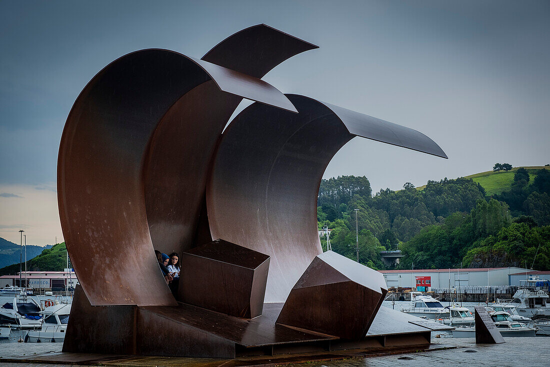 The wave, sculpture by Nestor Basterretxea, in the port of Bermeo, Vizcaya, Basque Country. Spain,