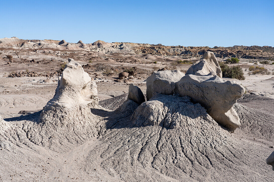 Eroded geologic formations in the barren landscape in Ischigualasto Provincial Park in San Juan Province, Argentina.