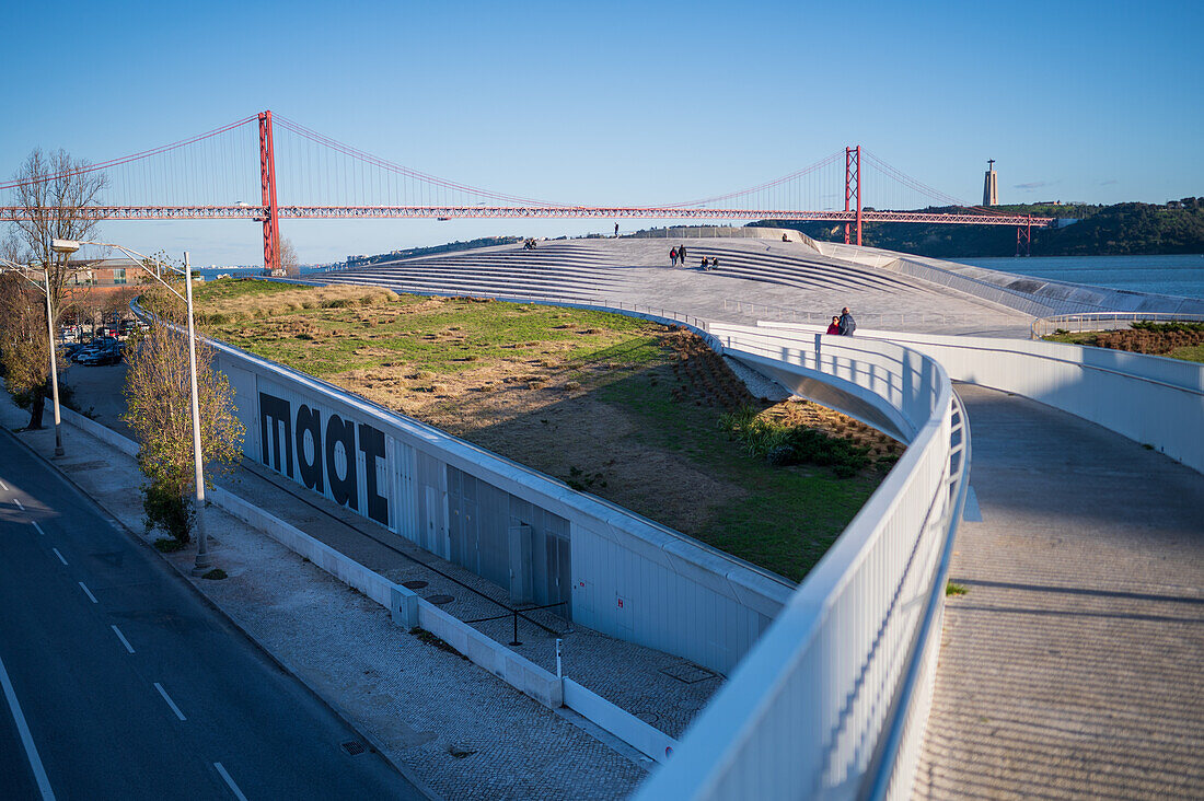View of Ponte 25 de Abril bridge from MAAT (Museum of Art, Architecture and Technology) roof, designed by the British architect Amanda Levete, Belem, Lisbon, Portugal
