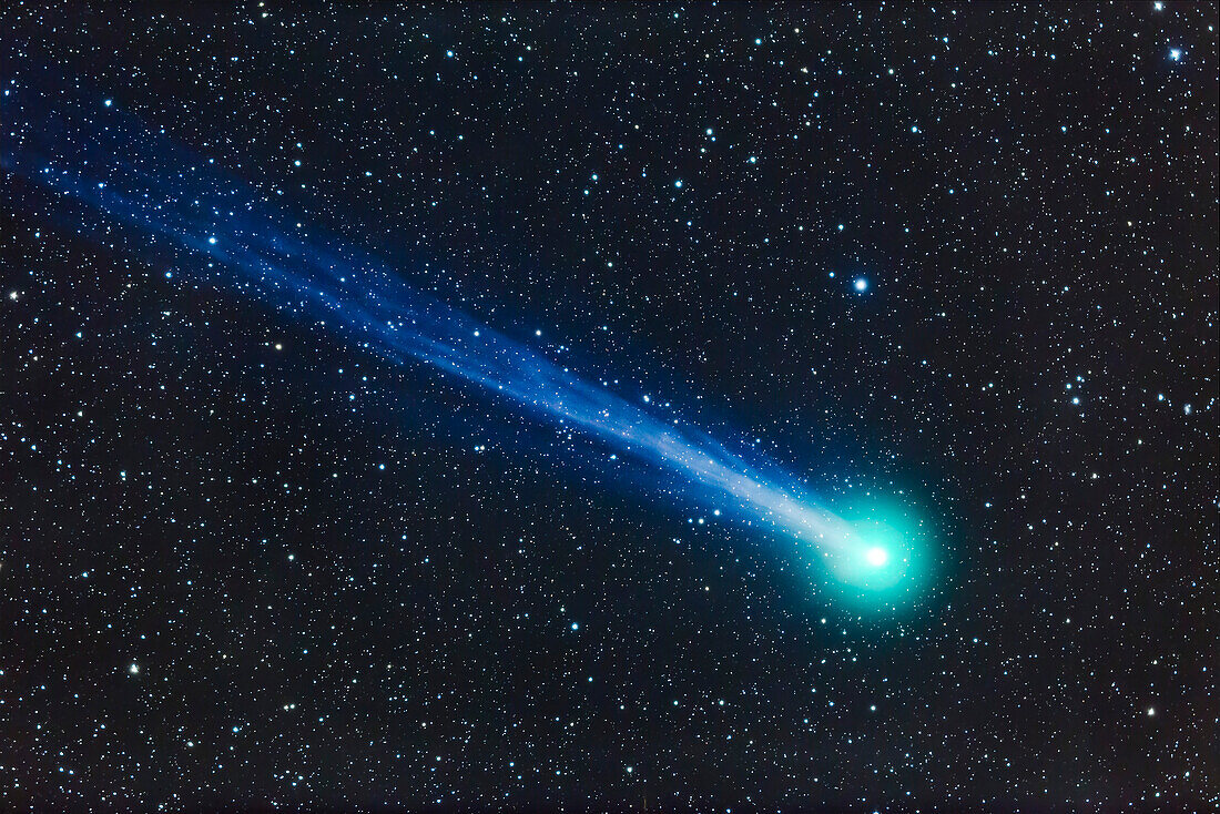A telescopic closeup of Comet Lovejoy (C/2014 Q2) on January 19, 2015. I shot this from near Silver City, New Mexico, using a TMB 92mm apo refractor at f/4.4 and using a Canon 6D at ISO 1600 for a stack of 4 x 5 minute exposures. The ion tail is primarily from a single exposure to minimize blurring from the comet’s motion relative to the stars. The rest of the image is from the stacked combination to minimize noise.