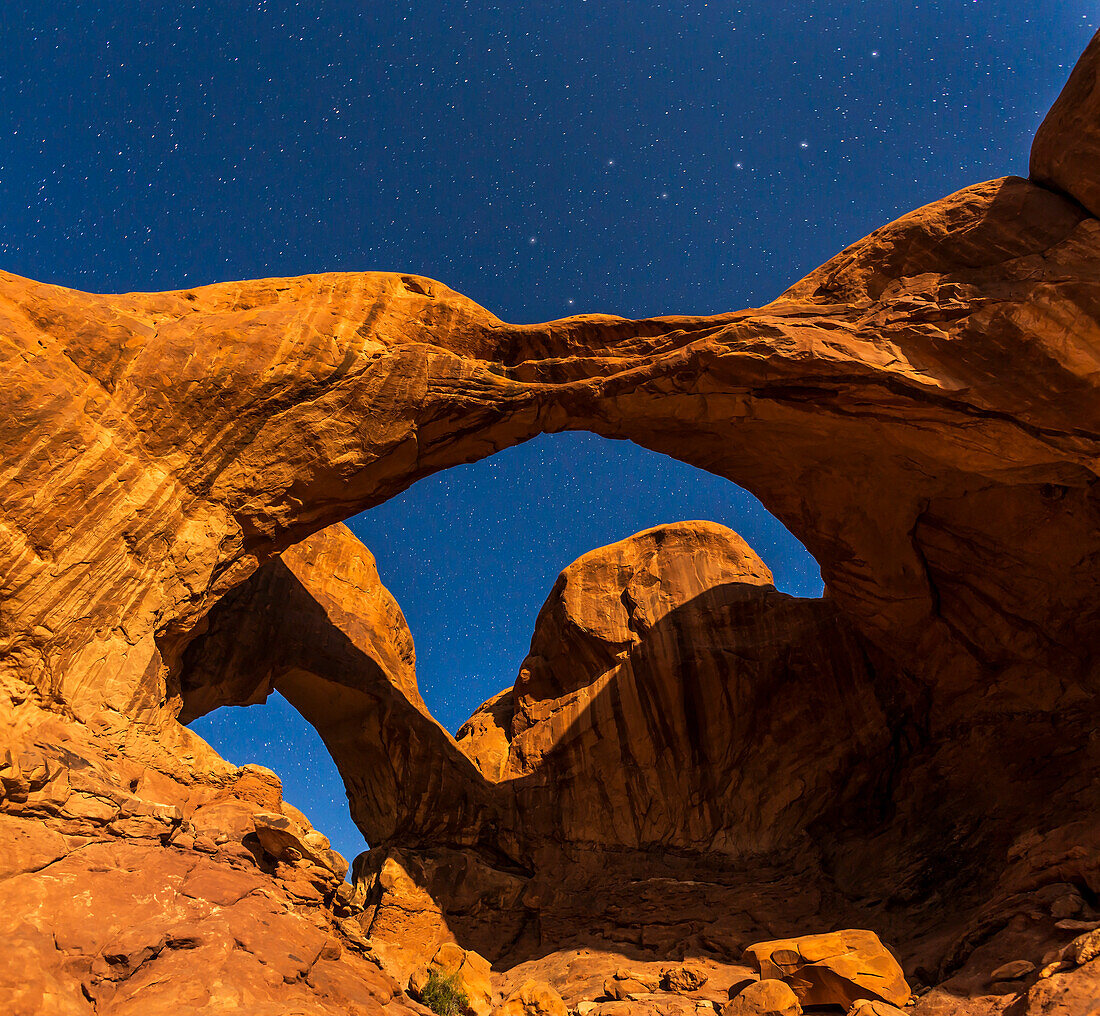 The Big Dipper over Double Arch in the moonlight, at Arches National Park, Utah, on April 6, 2015 with illumination from a waning gibbous Moon.