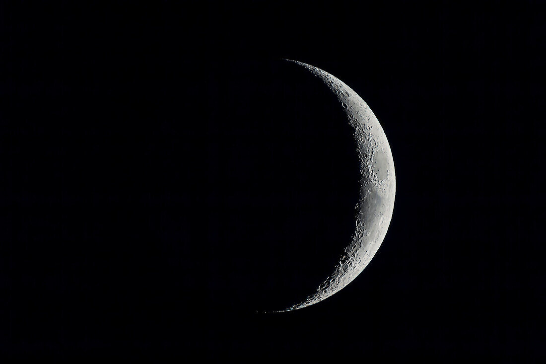 The 4-day-old waxing crescent Moon (more like the 3.5-day Moon) on April 8, 2019 exposed for just the bright sunlit crescent, revealing details along the terminator.