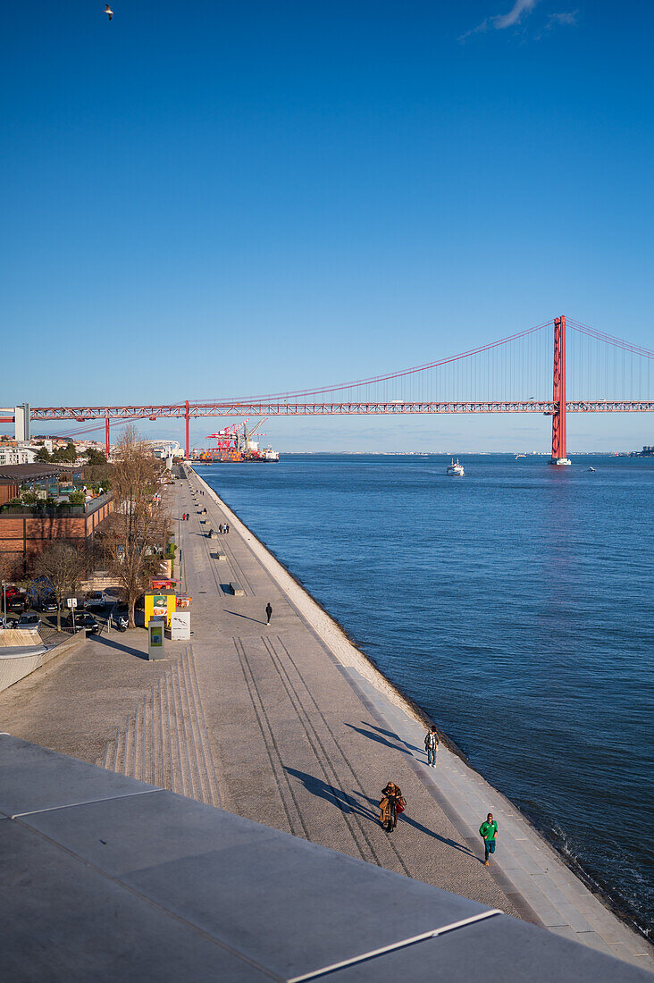 View of Ponte 25 de Abril bridge from MAAT (Museum of Art, Architecture and Technology) roof, designed by the British architect Amanda Levete, Belem, Lisbon, Portugal