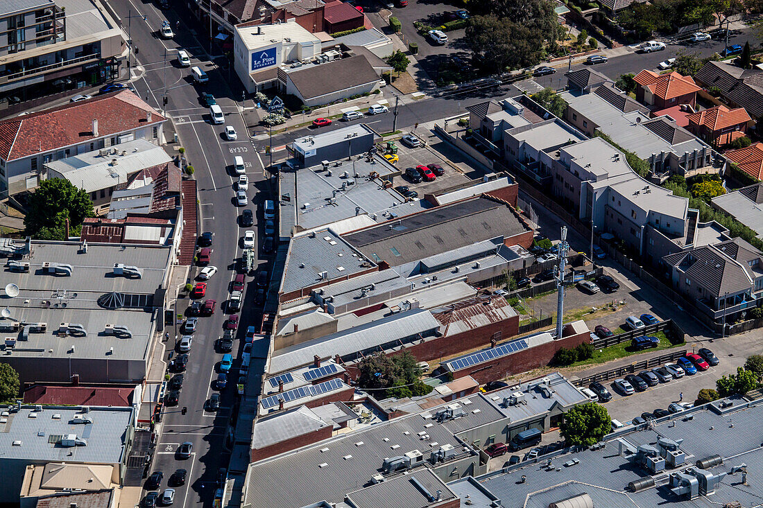 Close up aerial view of Upper Heidelberg Road in Ivanhoe, Victoria, Australia