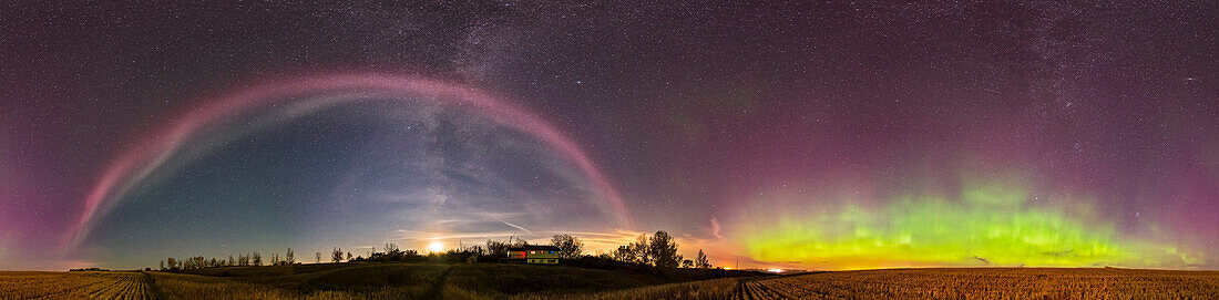 A 360° panorama of the odd isolated auroral arc that has become known as “Steve,” here to the left as a pink and white band, across the south, with the main auroral oval to the north at right, with its more normal oxygen green arc and upper red and magenta tints, also from atomic oxygen.