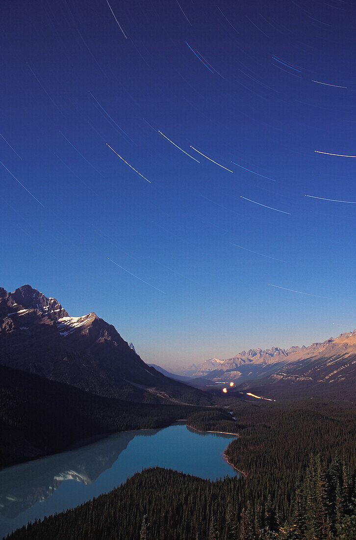 The Big Dipper in a long exposure, trailing over Peyto Lake, Banff, Alberta in a film shot from the 1990s. A single long exposure about 20 minutes on slow Fuji Velvia film.