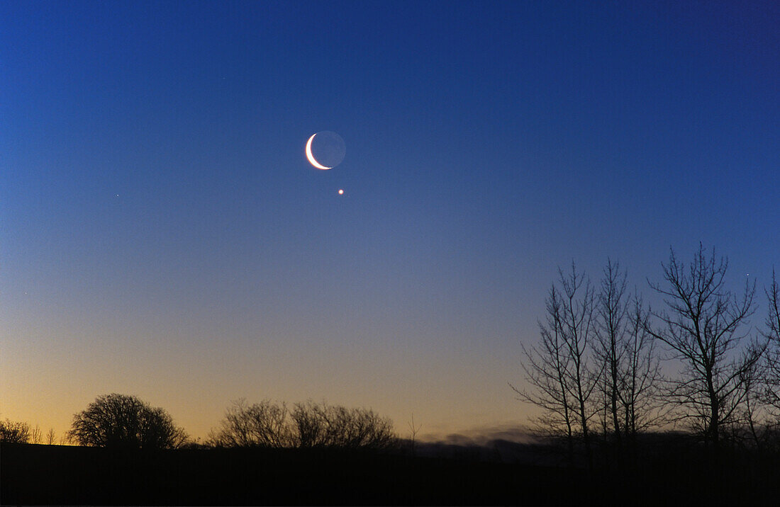 Conjunction of Waning crescent Moon near Venus, February 2, 2000 in morning sky.200mm telephoto lens.from home in Alberta, early in morning (#1 is same event but a few minutes earlier in darker sky)