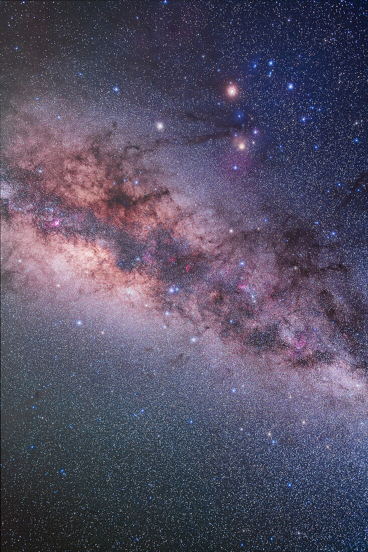 The constellation of Scorpius with bright reddish Antares at top, with even brighter reddish Mars above it, and whie Saturn to the left of Antares. This shows all of Scorpius with Corona Australis and Ara below.