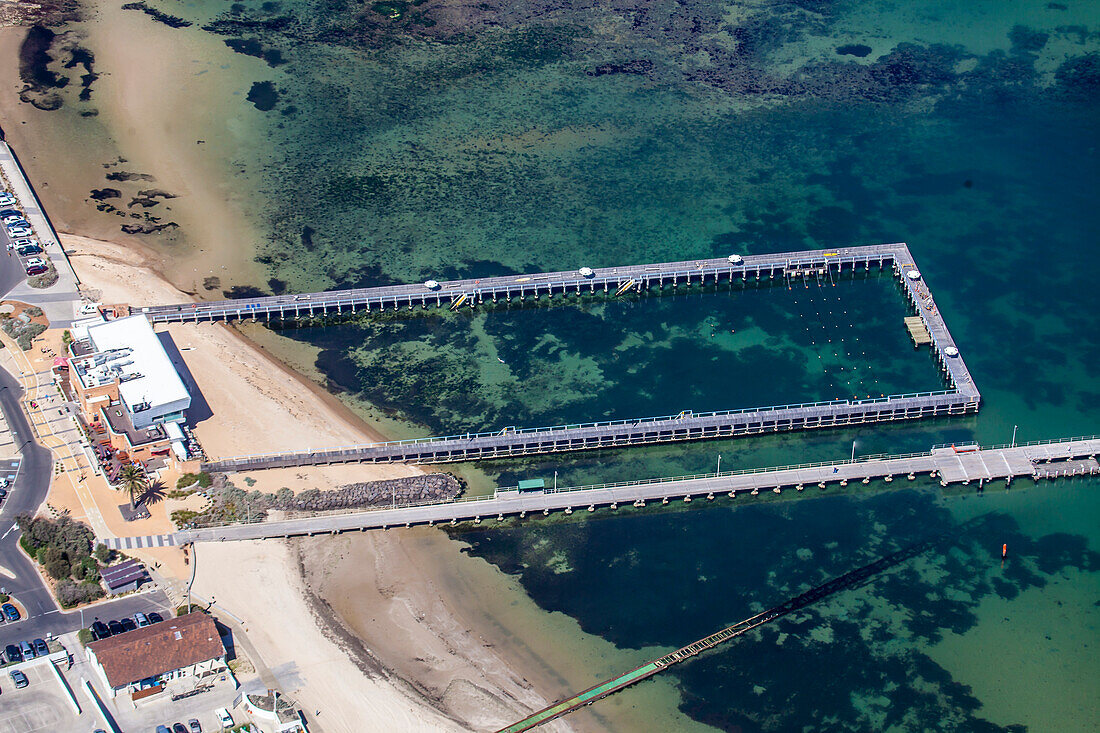 Aerial view of the Middle Brighton Baths in and the Baths Cafe in Brighton Victoria, Australia