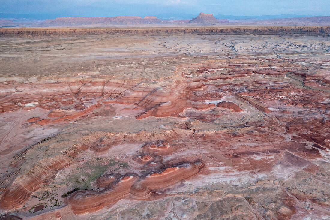 Aerial view of the colorful Bentonite Hills and Factory Butte before dawn, near Hanksville, Utah.