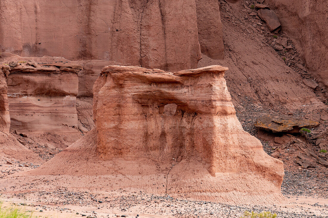 A small arch in the sandstone by the mouth of Shimpa Canyon in Talampaya National Park, La Rioja Province, Argentina.