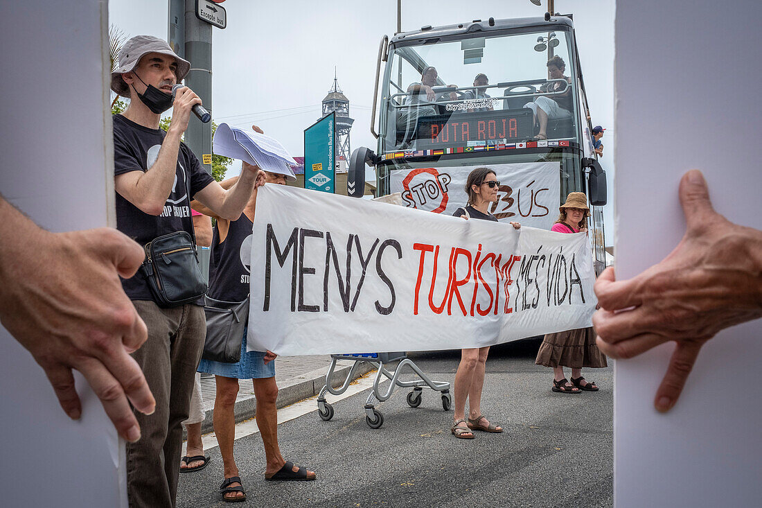 Activists block the tourist bus to protest the tourist massification of the city of Barcelona, Barcelona, Spain