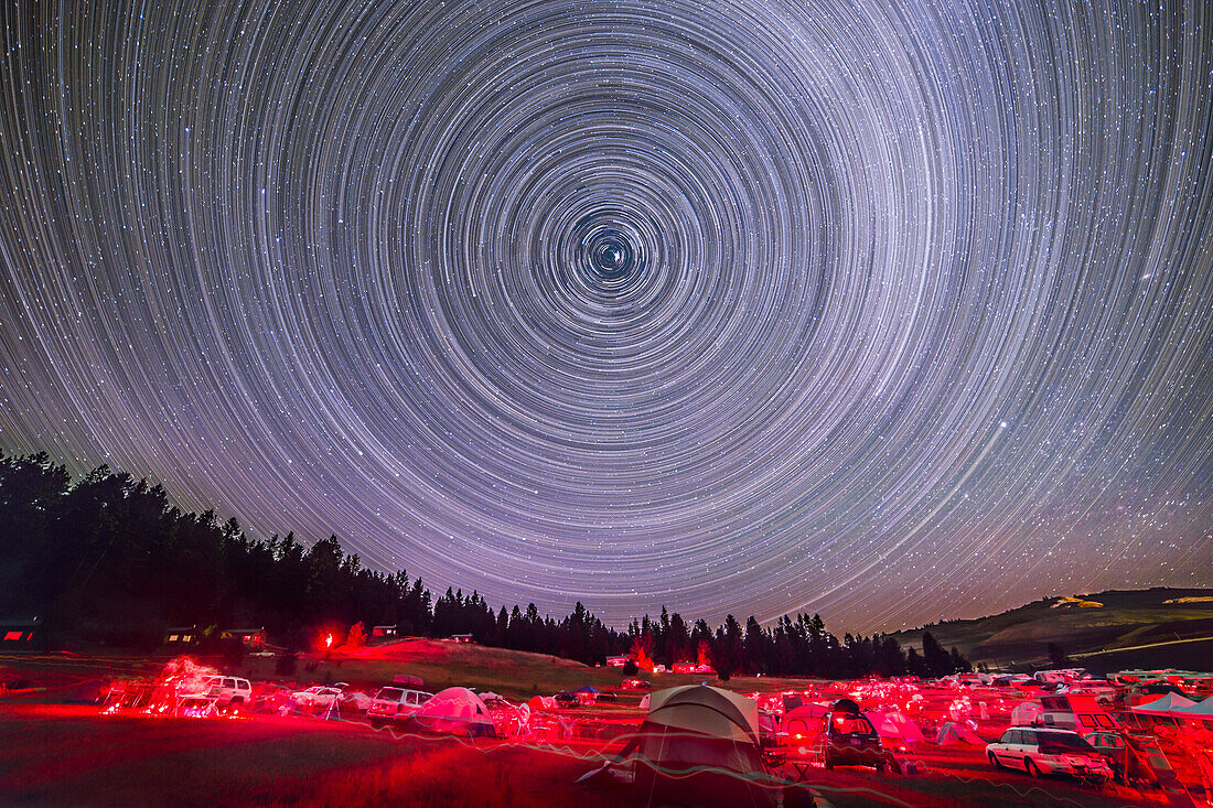 A circumpolar star trail stack taken from the Table Mountain Star Party, July 26, 2014, at the Eden Valley Guest Ranch. This is a stack created from 250 frames taken for a time-lapse movie, stacked using Advanced Stacker Actions with "Elastic Stars" effect. Each frame was 45 seconds at f/2.8 with the Rokinon 14mm lens and Canon 6D at ISO 2000.