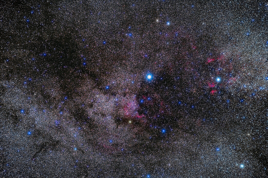 The region of the summer Milky Way in northern Cygnus containing a rich collection of bright nebulas: the North America Nebula at centre and the Gamma Cygni complex at right, plus the dark nebulas Le Gentil 3, the Funnel Cloud Nebula at upper left, the Northern Coal Sack at centre, and the finger-like B168 at lower left. The bright star at centre is Deneb. M39 is at lower left.