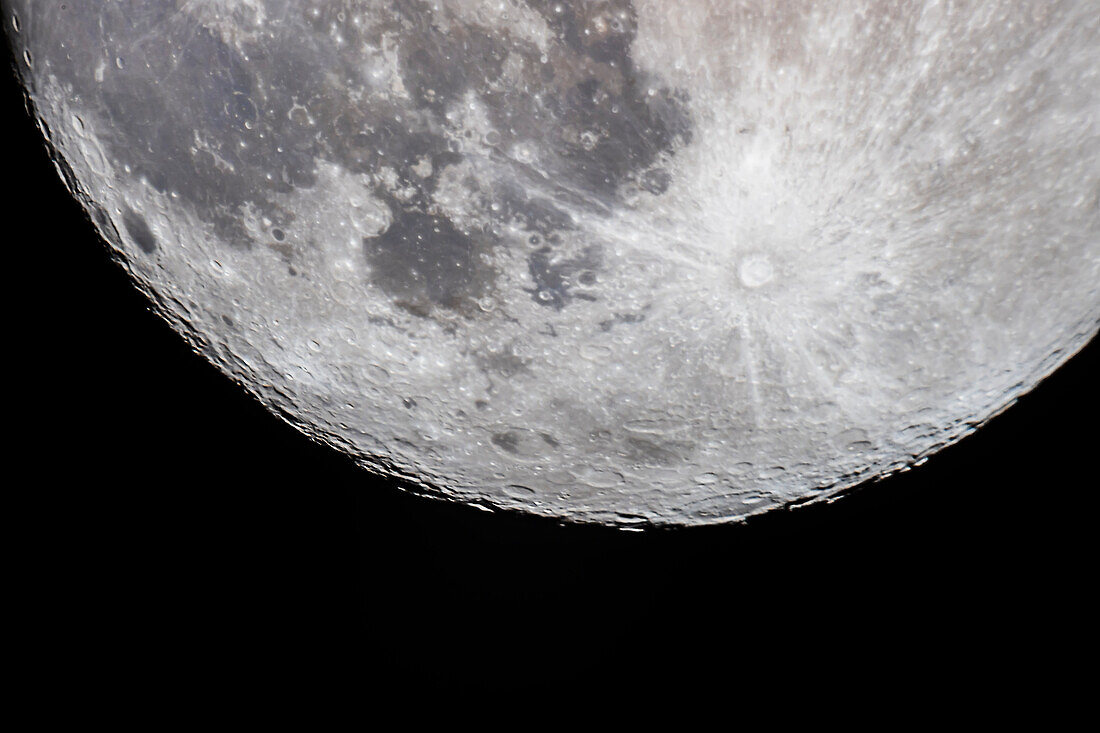 The 13.7-day-old Moon (a day before Full) with the south polar region tipped toward us in a favourable libration for viewing the southern regions and features. This was April 6, 2020. The large crater, Bailly, is on the southern limb, better seen here than at most similar phases, due to the favourable southern libration.