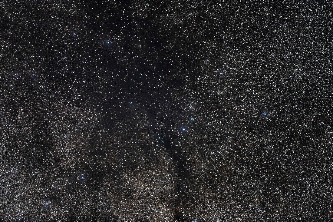 The dark nebula on the Cygnus-Cepheus border nicknamed the Funnel Cloud Nebula (a name provided by Alan Whitman in a 2006 Sky and Telescope article) but that is a very prominent naked eye feature to the northern Milky Way, more obvious as a dark area than the Northern Coal Sack to the south. This is a fine object for binoculars and the telephoto lens shot here provides the field of most binoculars.