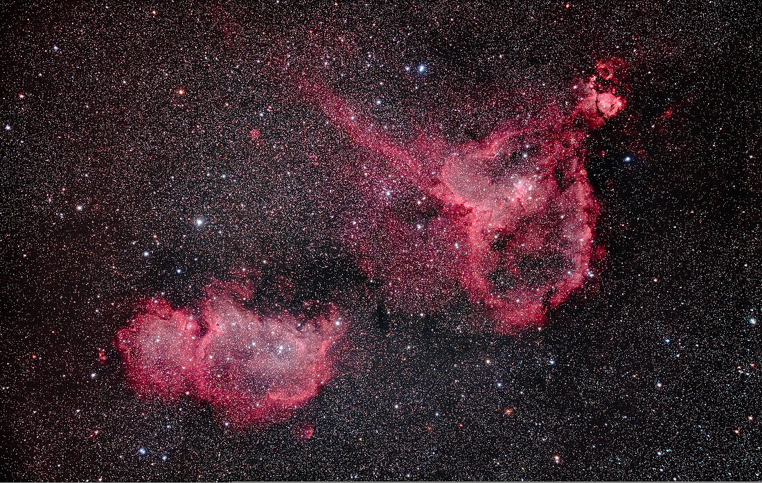 The Heart Nebula (aka IC 1805) at right, and the Soul Nebula (aka IC 1848) at left, in Cassiopeia. The round nebula at top right is NGC 896. The star cluster at right embedded in the Heart Nebula is NGC 1027. Shot from home in Alberta on November 21, 2019.