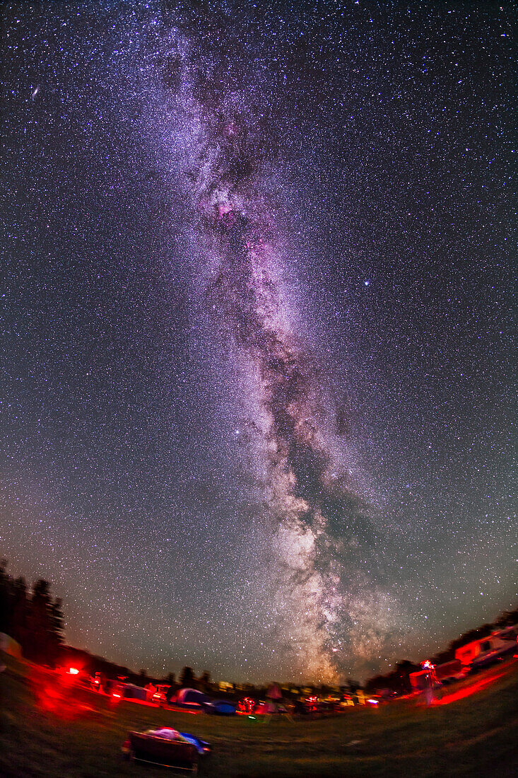 The northern summer Milky Way over the Saskatchewan Summer Star Party in Cypress Hills, Saskatchewan, Canada, August 18, 2012. Taken with the Canon 5D MkII at ISO 800 and 15mm lens at f/4 for a stack (mean combined) of four 5 minute exposures, all tracked. The ground is from only one of those expoures (the gorund is masked out in the other layers).