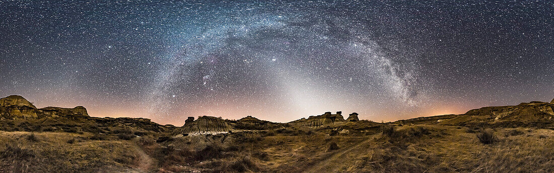 A 360° panorama of the winter sky over Dinosaur Provincial Park, Alberta, on February 28, 2017. The Milky Way arches across the sky from south (left) to northeast (right). The Zodiacal Light stretches up from the western horizon at centre. The Gegenschein is faintly visible above the horizon at far left in Leo.