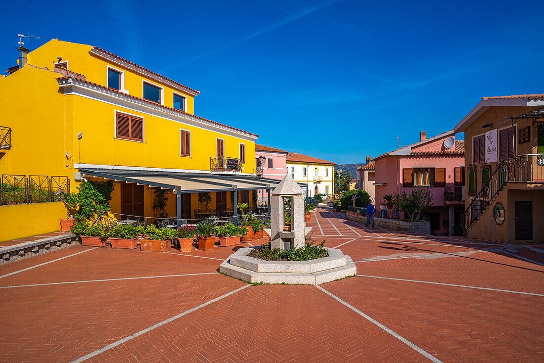 View of colourful buildings in Piazza Mediterraneo, San Teodoro, Sardinia, Italy, Mediterranean, Europe