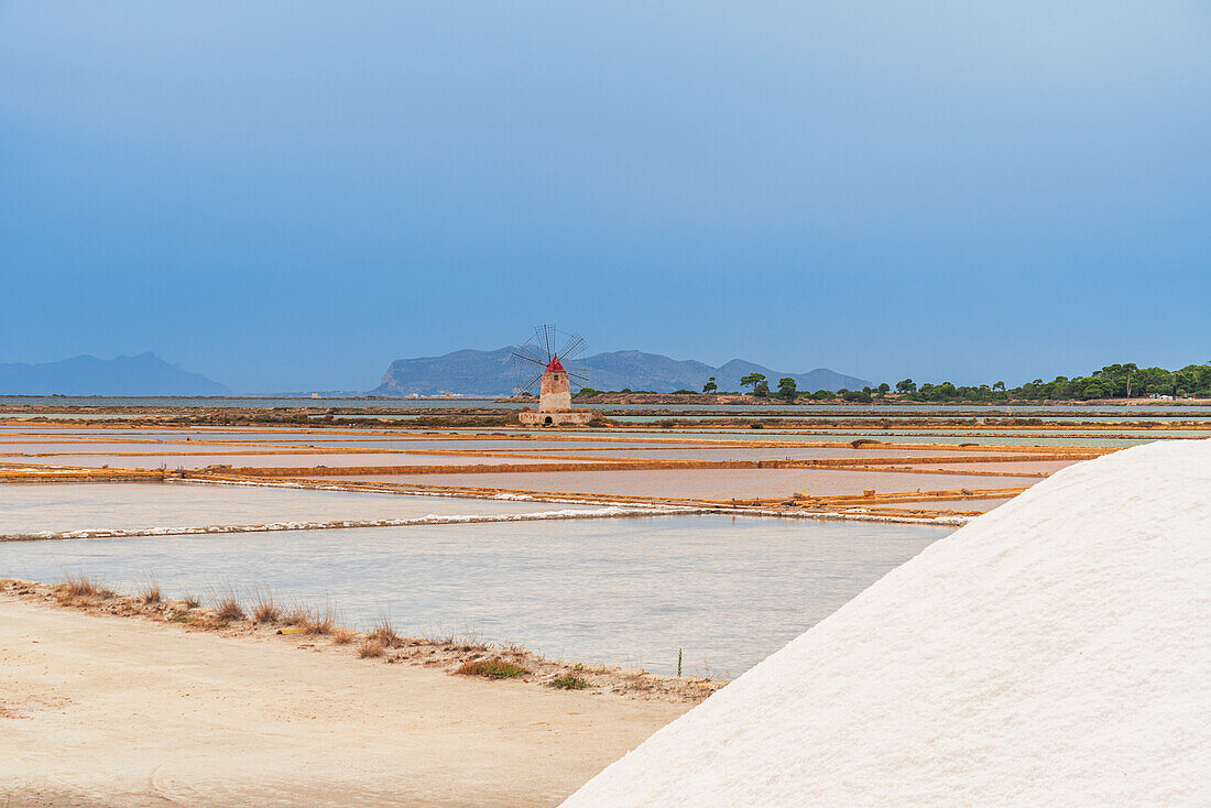 Windmill with pile of salt in the salt flats, Saline Ettore e Infersa, Marsala, province of Trapani, Sicily, Italy, Mediterranean, Europe