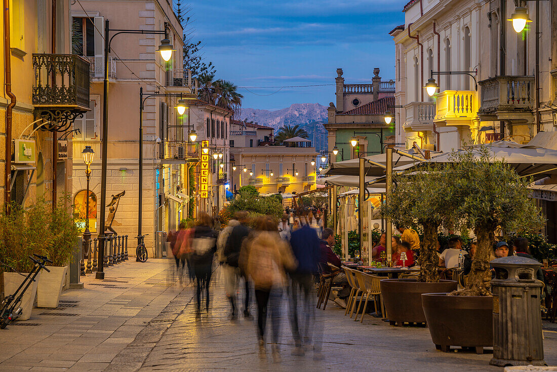 View of restaurants on Corso Umberto I at dusk in Olbia, Olbia, Sardinia, Italy, Mediterranean, Europe