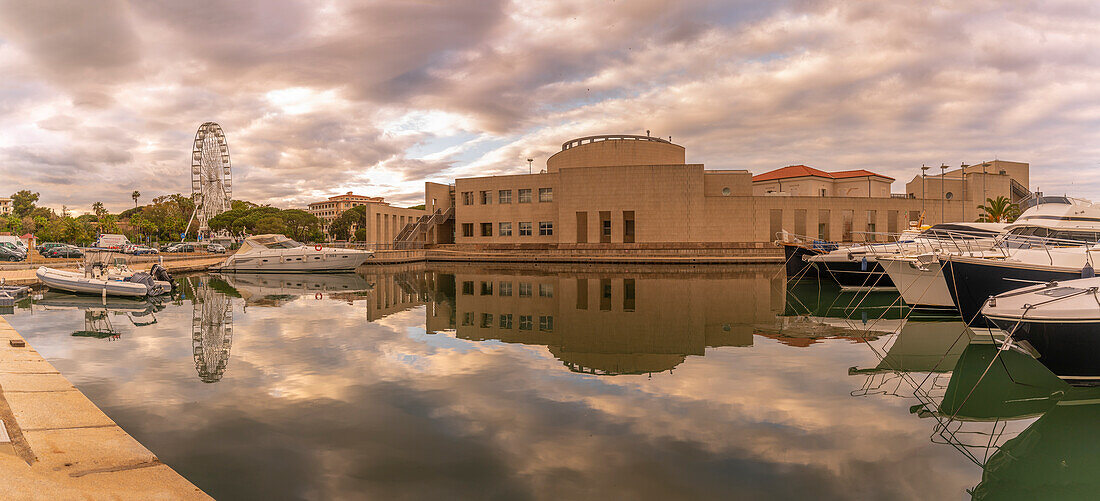 View of Archaeological Museum of Olbia and harbour boats on sunny day in Olbia, Olbia, Sardinia, Italy, Mediterranean, Europe