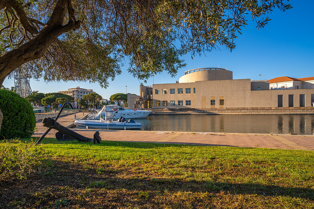 View of Archaeological Museum of Olbia and harbour boats on sunny day on Olbia, Olbia, Sardinia, Italy, Mediterranean, Europe