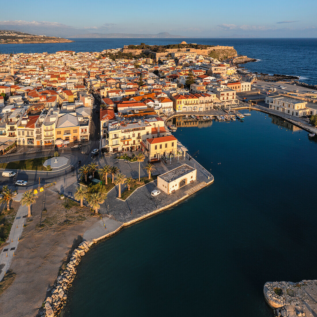 Aerial of Venetian harbor with a view of Venetian Fortezza, Rethymno, Crete, Greek Islands, Greece, Europe