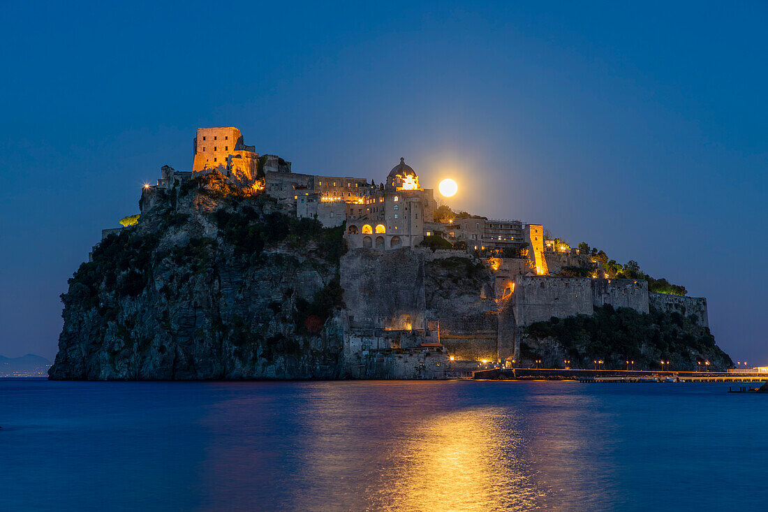 Castello Aragonese at dusk, Island of Ischia, Campania, Italy, Europe