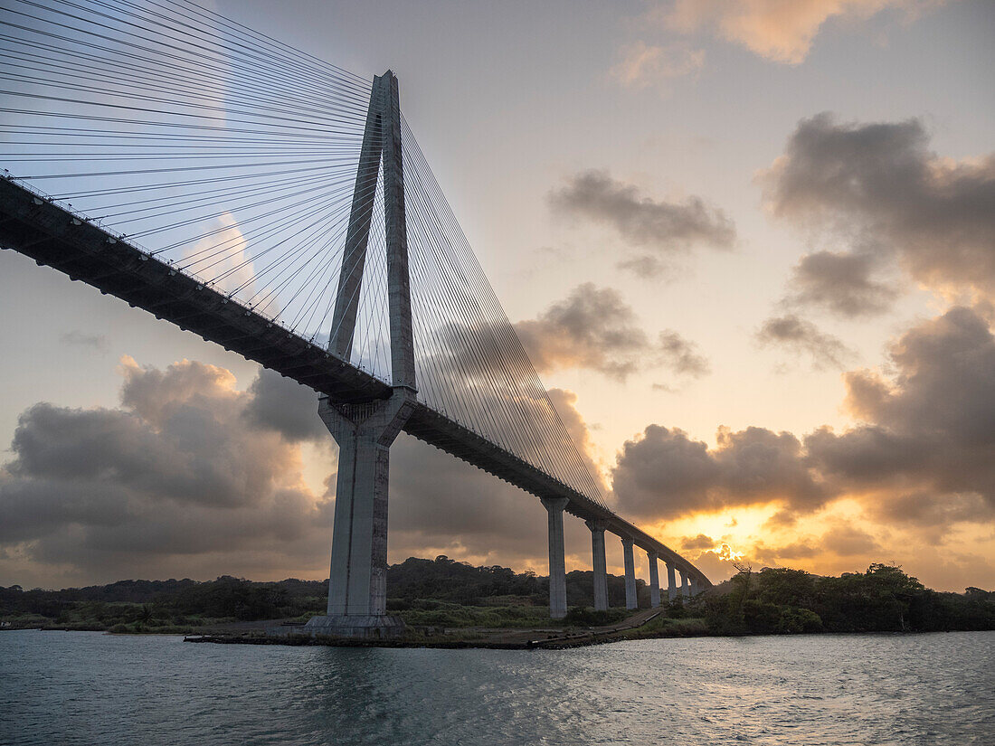 Panama's Centennial Bridge at sunset crossing the Panama Canal, Panama, Central America