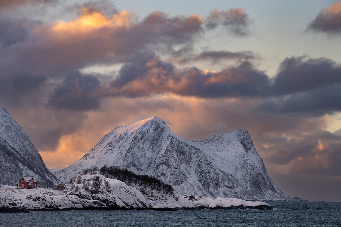 View of Hamn and Teistevika at sunset backed by Indre Teisten mountain, Hamn, Senja, Troms og Finnmark County, Norway, Scandinavia, Europe