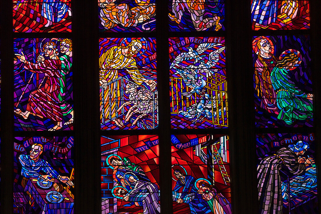 Detail of colorful stained glass window inside St. Vitus Cathedral, Prague Castle, UNESCO World Heritage Site, Prague, Bohemia, Czech Republic (Czechia), Europe