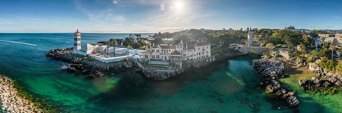 Aerial drone panoramic view of Santa Marta, Santa Marta House Museum and Condes de Castro Guimaraes Museum next to turquoise water in Cascais, Lisbon Region, Portugal, Europe