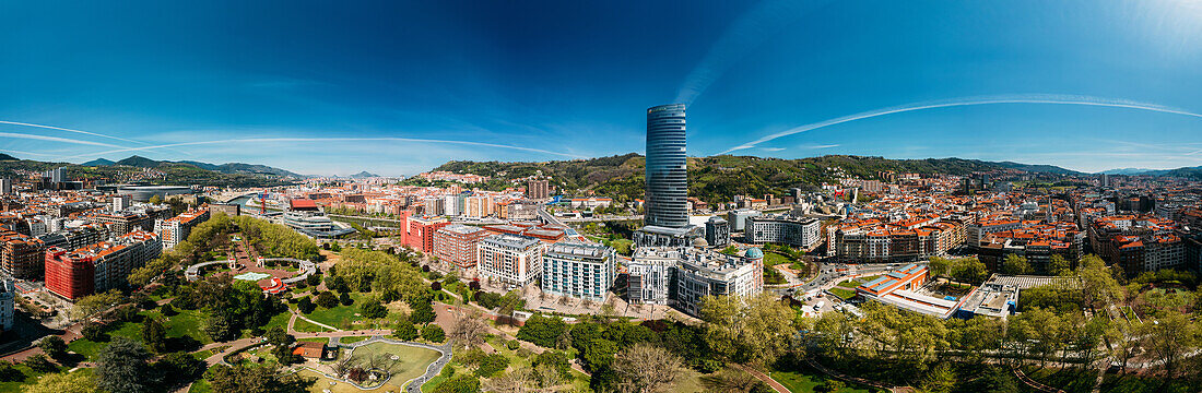 Aerial panoramic view of Bilbao, an industrial port city in northern Spain, is surrounded by green mountains, the de facto capital of Basque Country, Spain, Europe