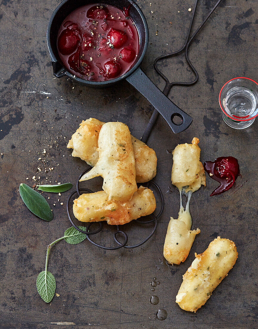 Gruyère fritters with pepper-cherry dip (Switzerland)