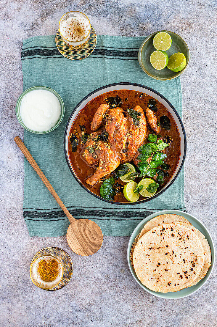 Spatchcock chicken curry with curry leaves, lime and roti