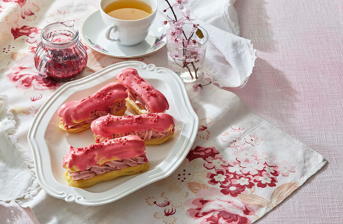 Eclairs with blackcurrant cream