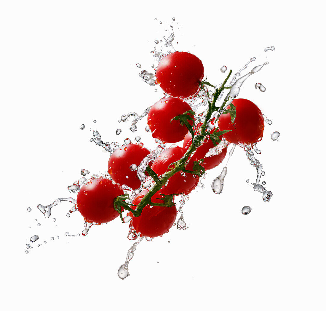 Cherry tomatoes making a splash
