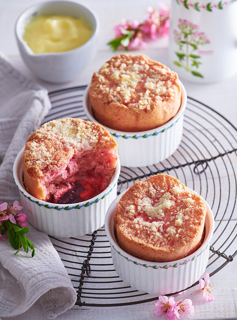 Rhubarb and blackberry soufflé with vanilla sauce