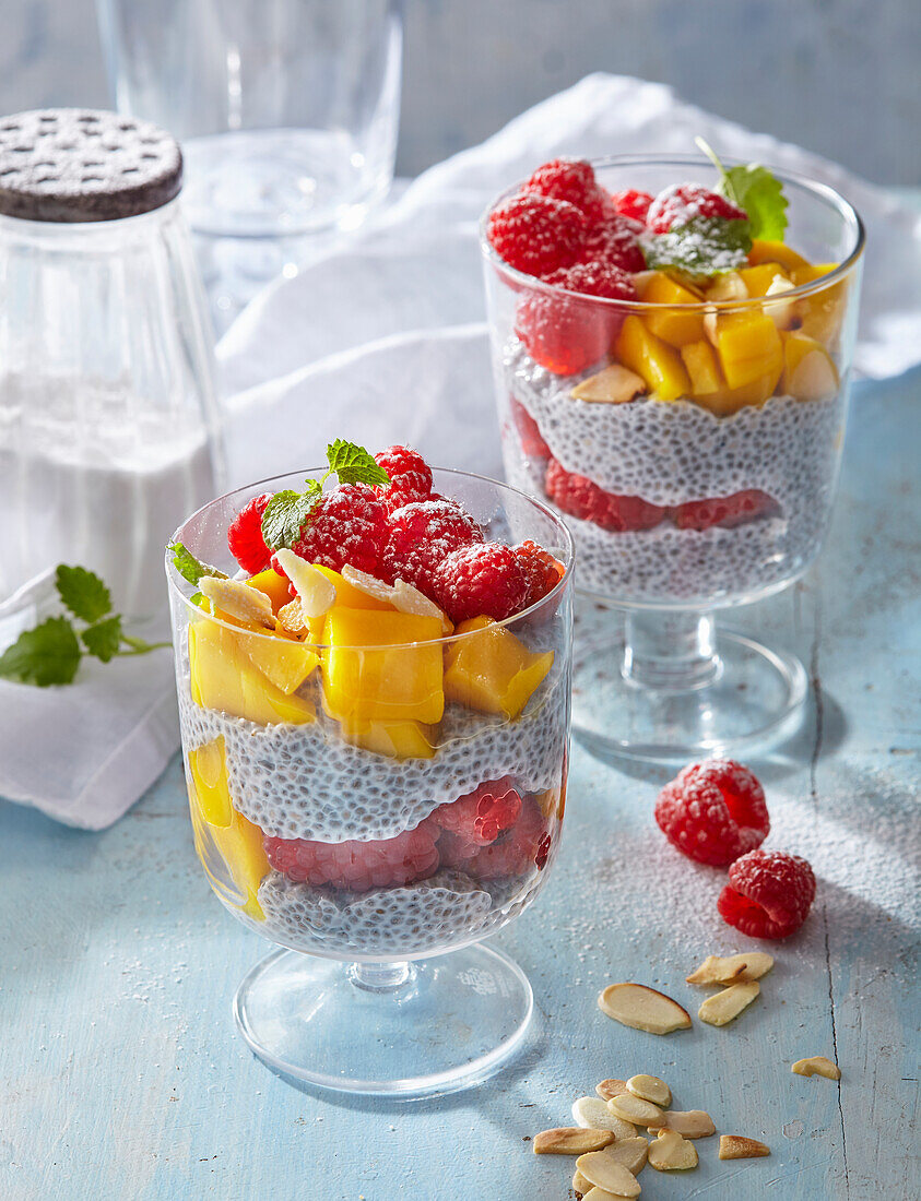 Chia pudding parfait with mango and raspberries